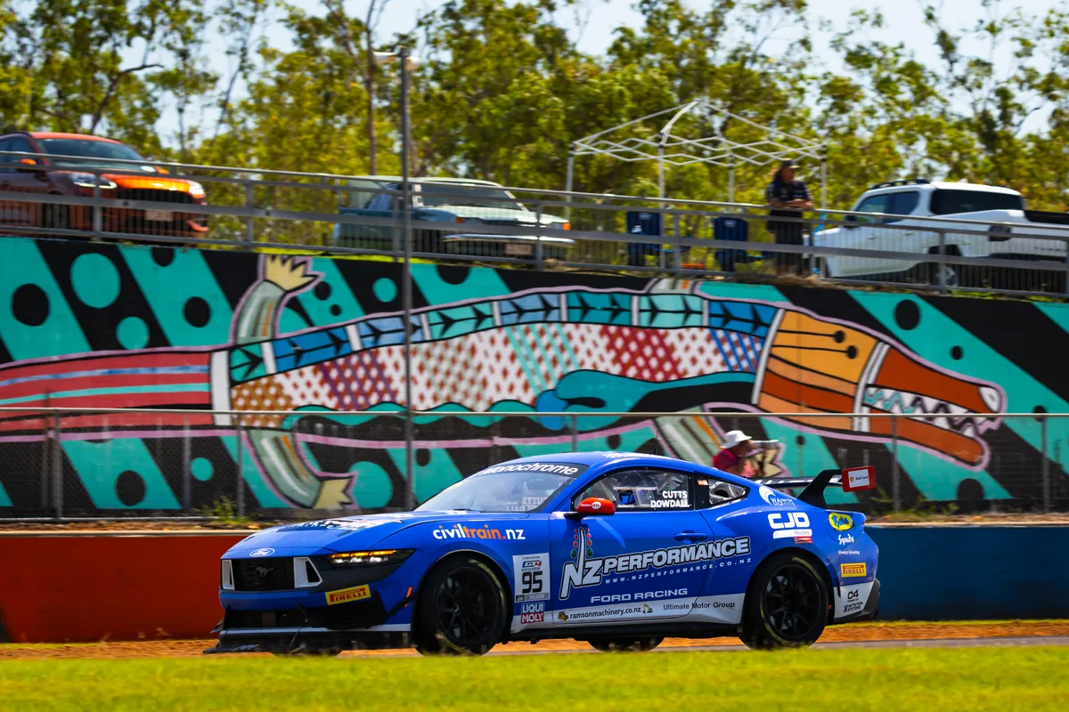 Blake Dowdall's #95 Ford Mustang GT4 passes the mural wall at Hidden Valley, Darwin