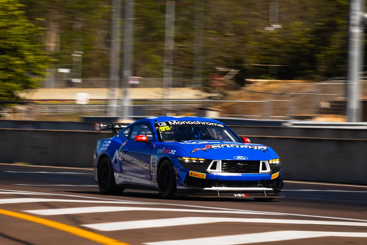 The #95 Ford Mustang GT4 at speed during qualifying at Hidden Valley