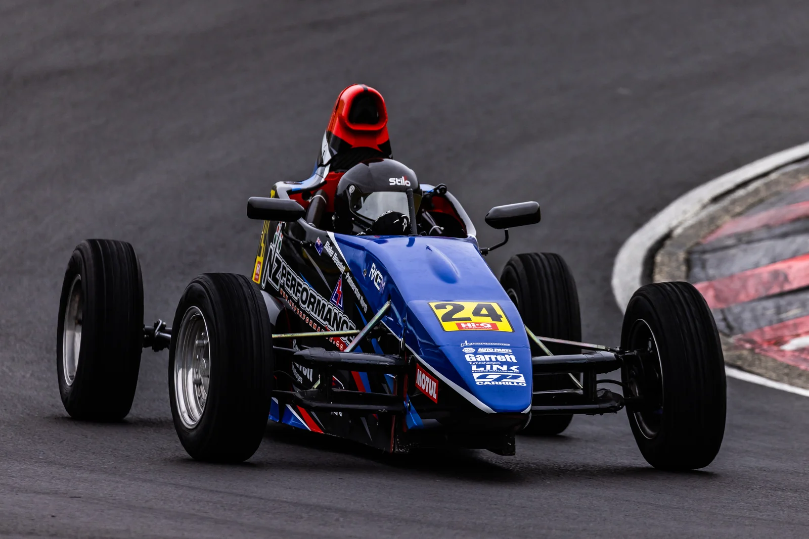 Blake Dowdall threads his #24 Formula First car through a corner at Hampton Downs.