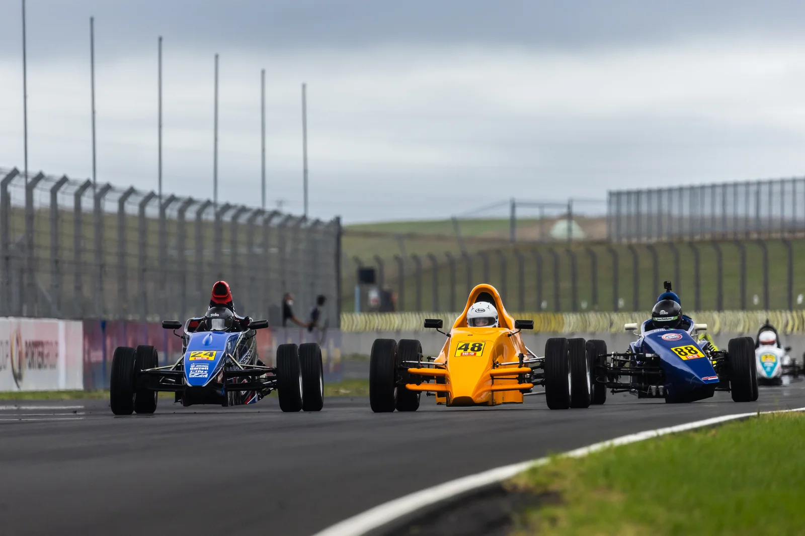 Blake Dowdall battles in the Formula First pack at Hampton Downs.