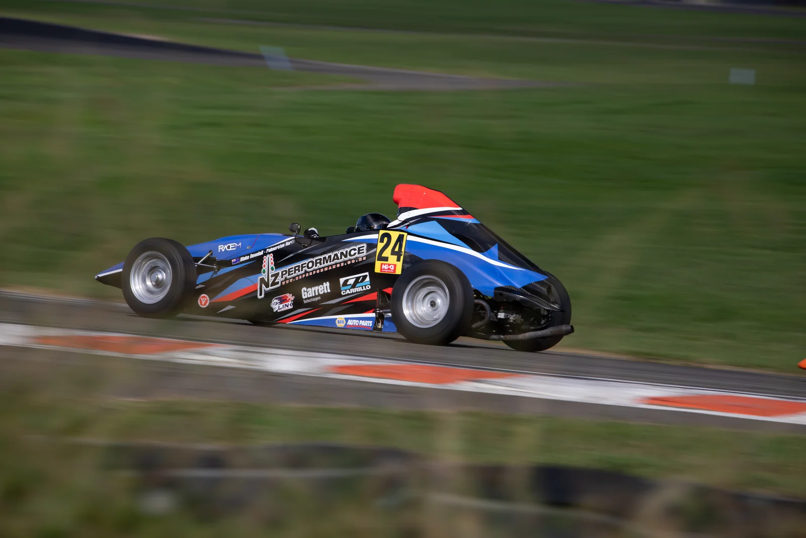 Blake Dowdall threads his #24 Formula First car through a corner at Manfeild.