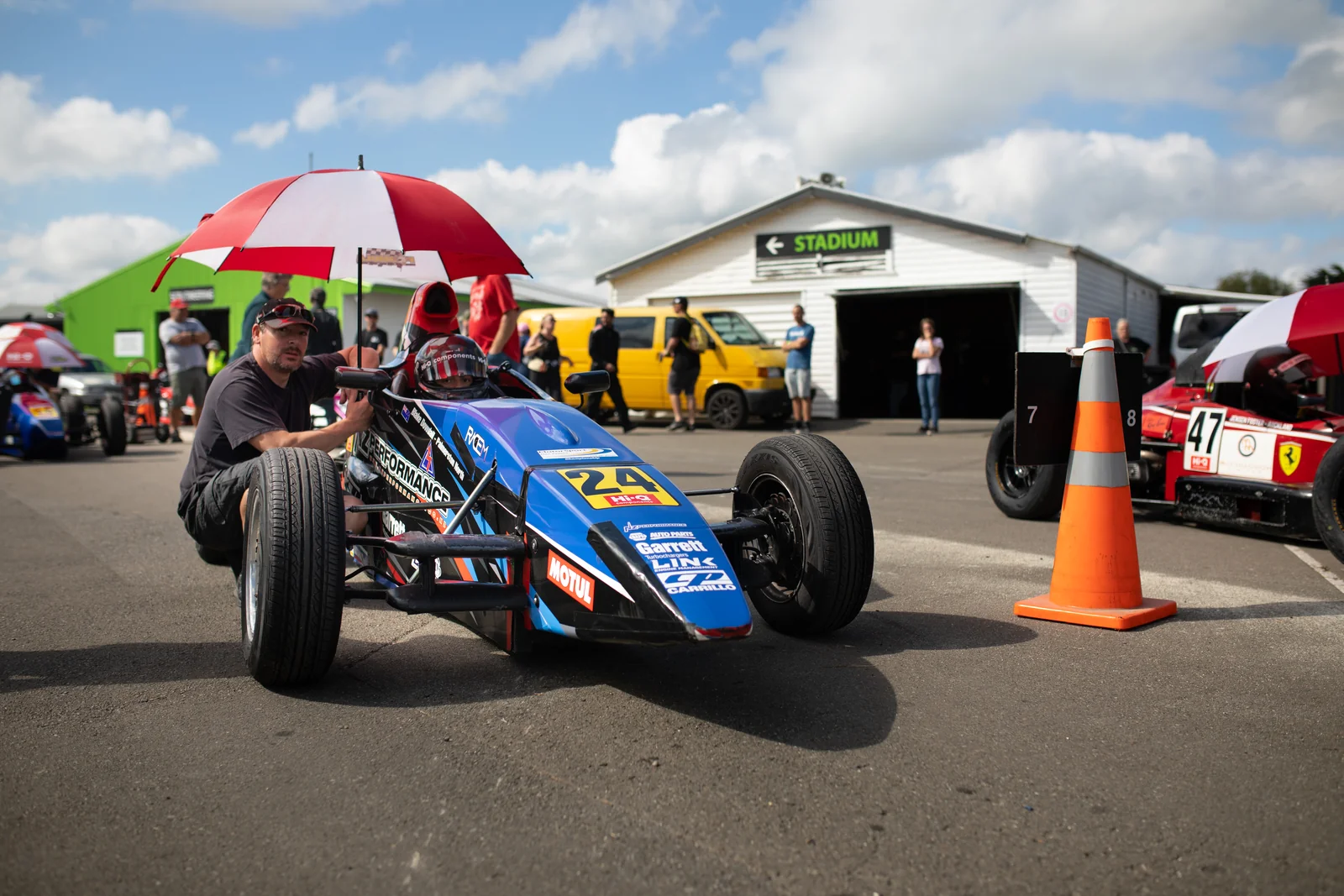 Blake Dowdall and his #24 Formula First car in the paddock at Manfeild.