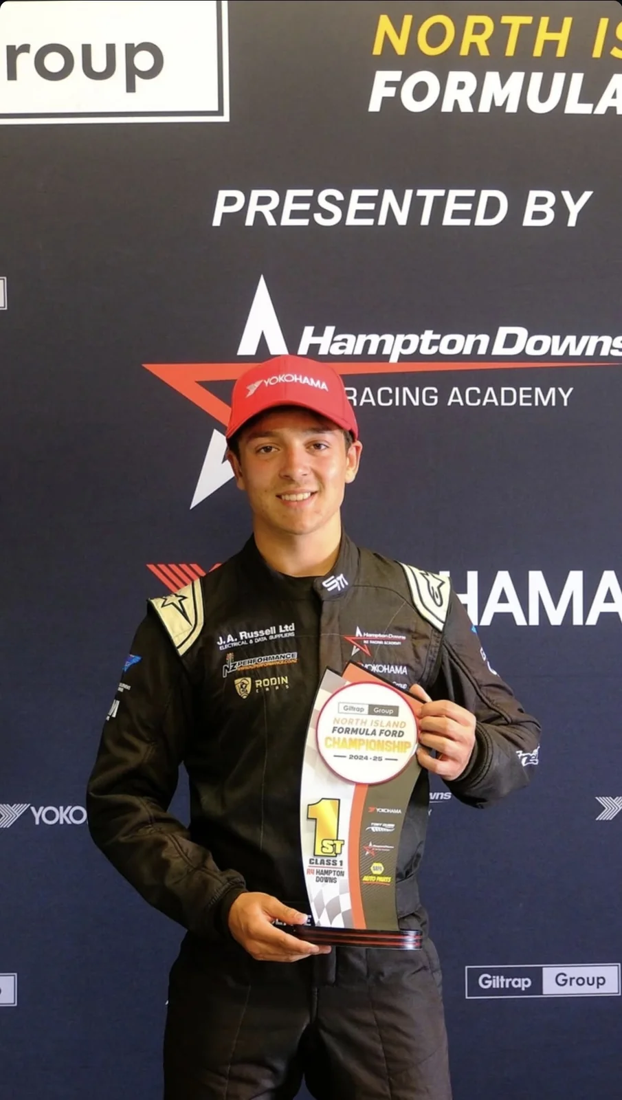 Blake Dowdall with the trophy at Hampton Downs.
