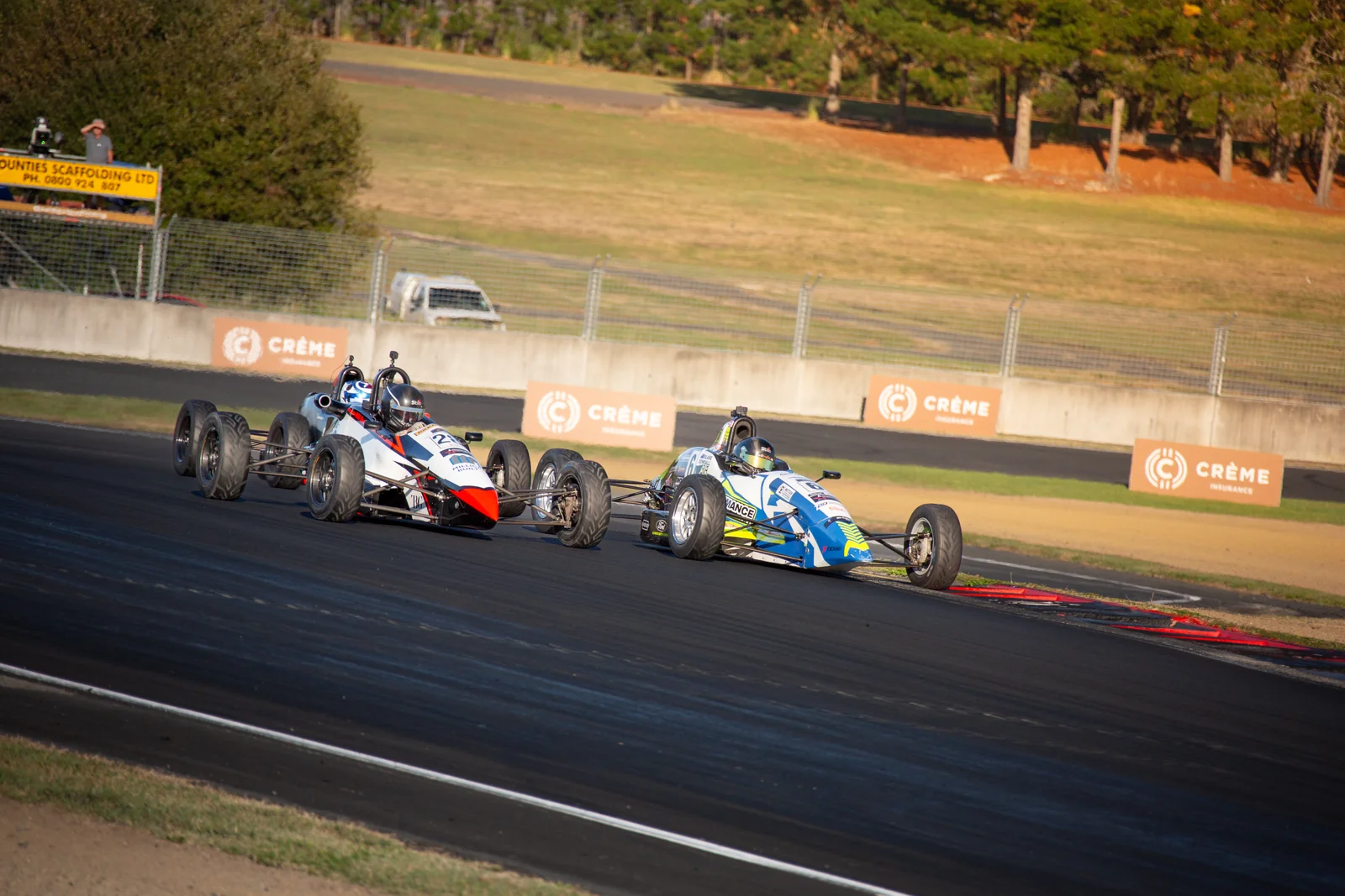 Blake Dowdall battles in the Formula Ford pack at Hampton Downs.