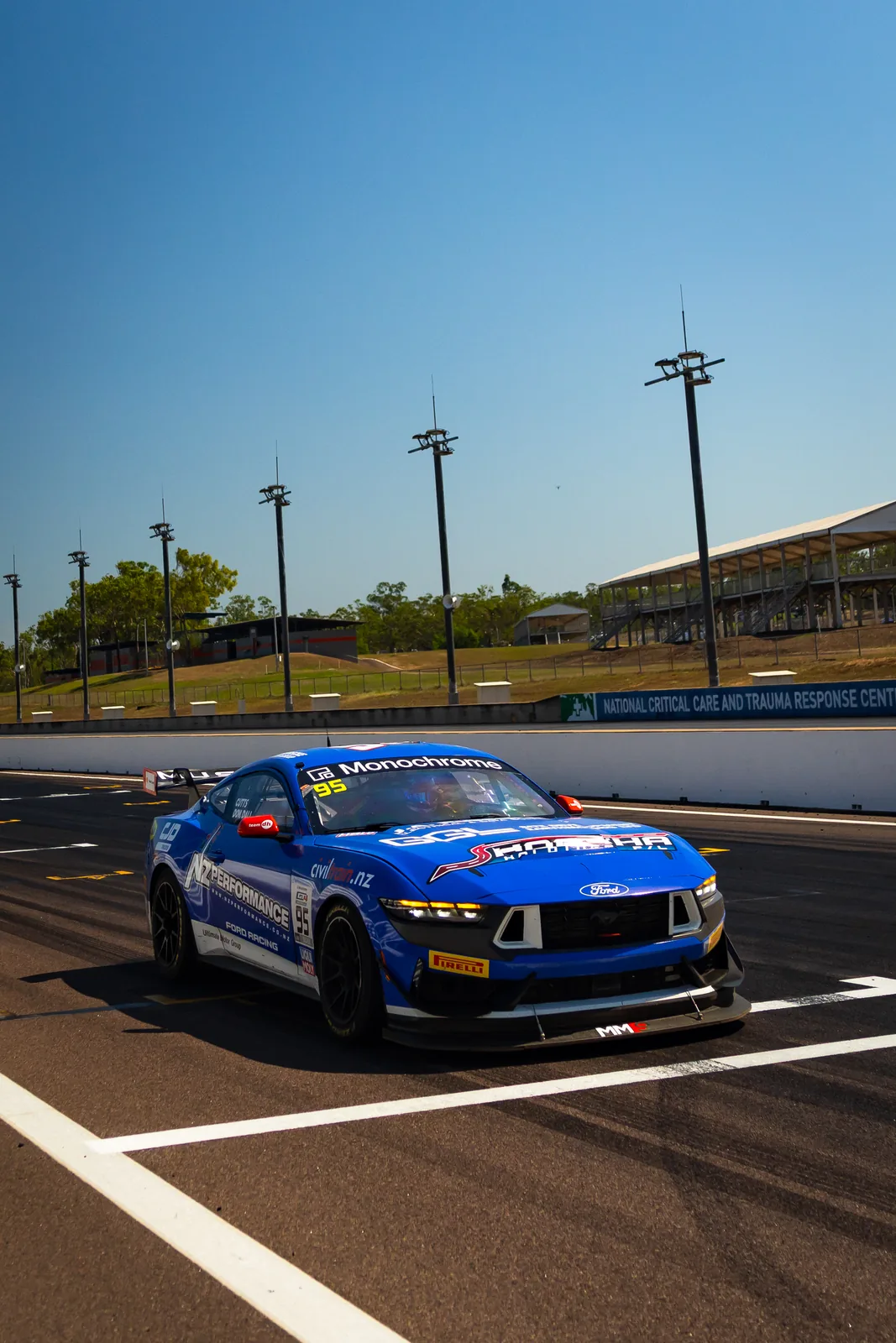 The #95 Ford Mustang GT4 head-on on the grid at Hidden Valley