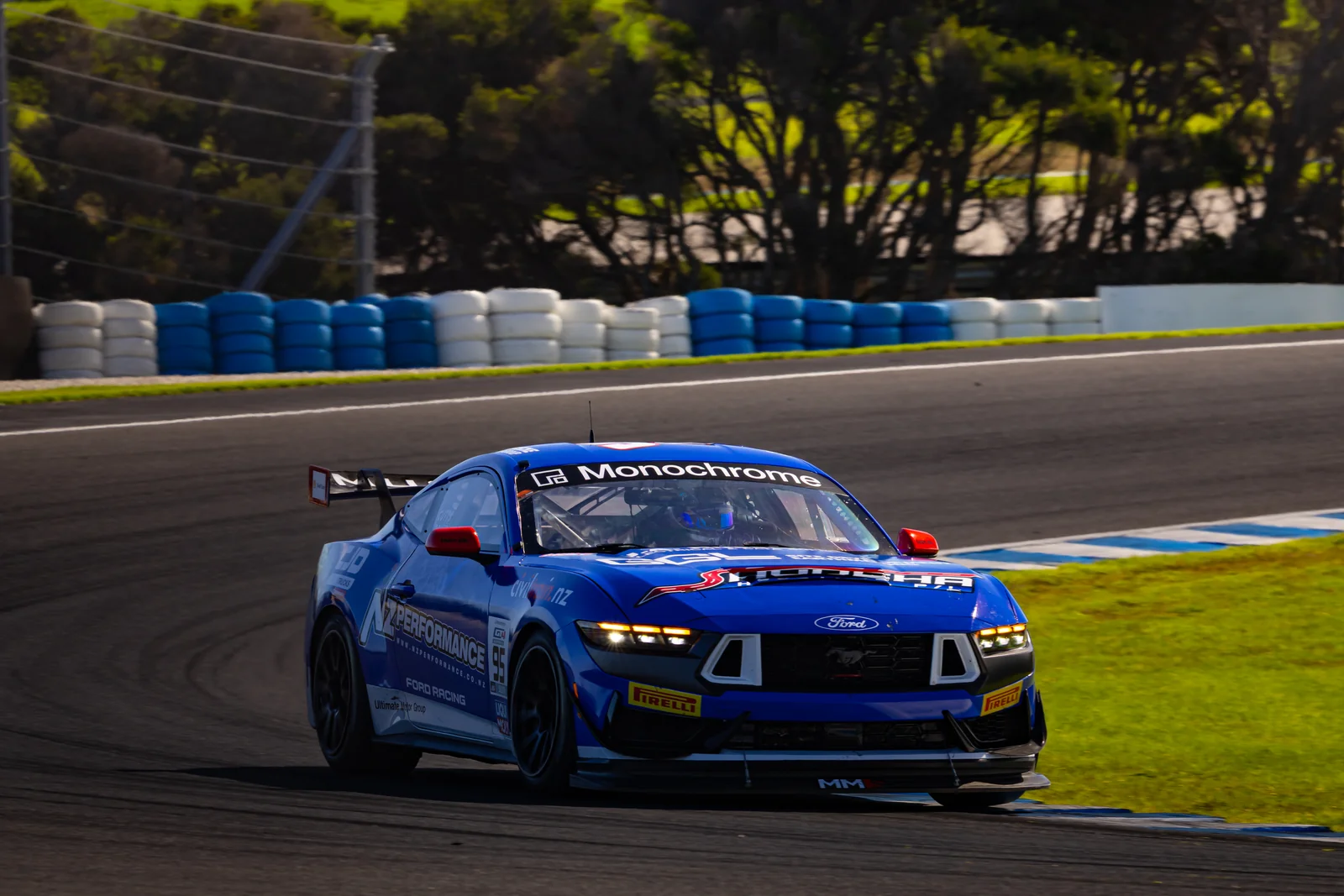 Blake Dowdall's Ford Mustang GT4 through a corner at Phillip Island
