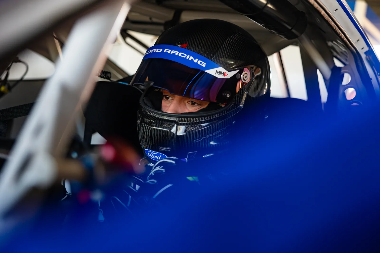 Blake Dowdall focused in the cockpit before qualifying at Queensland Raceway