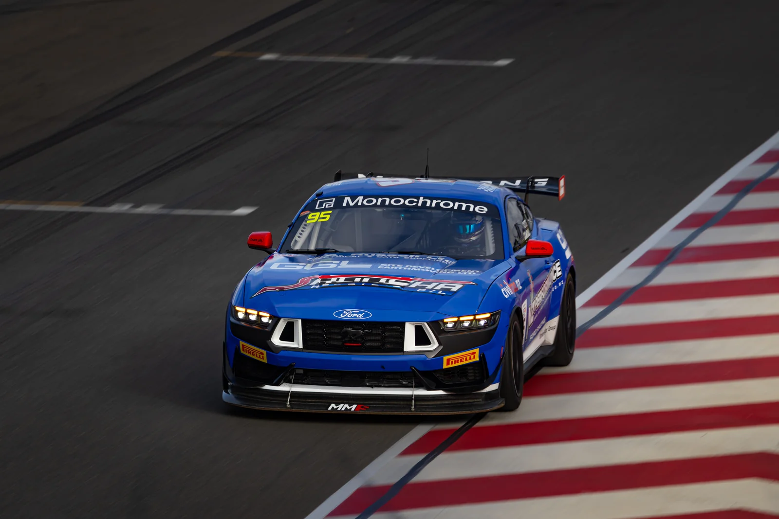 Blake Dowdall's Ford Mustang GT4 through a corner at The Bend