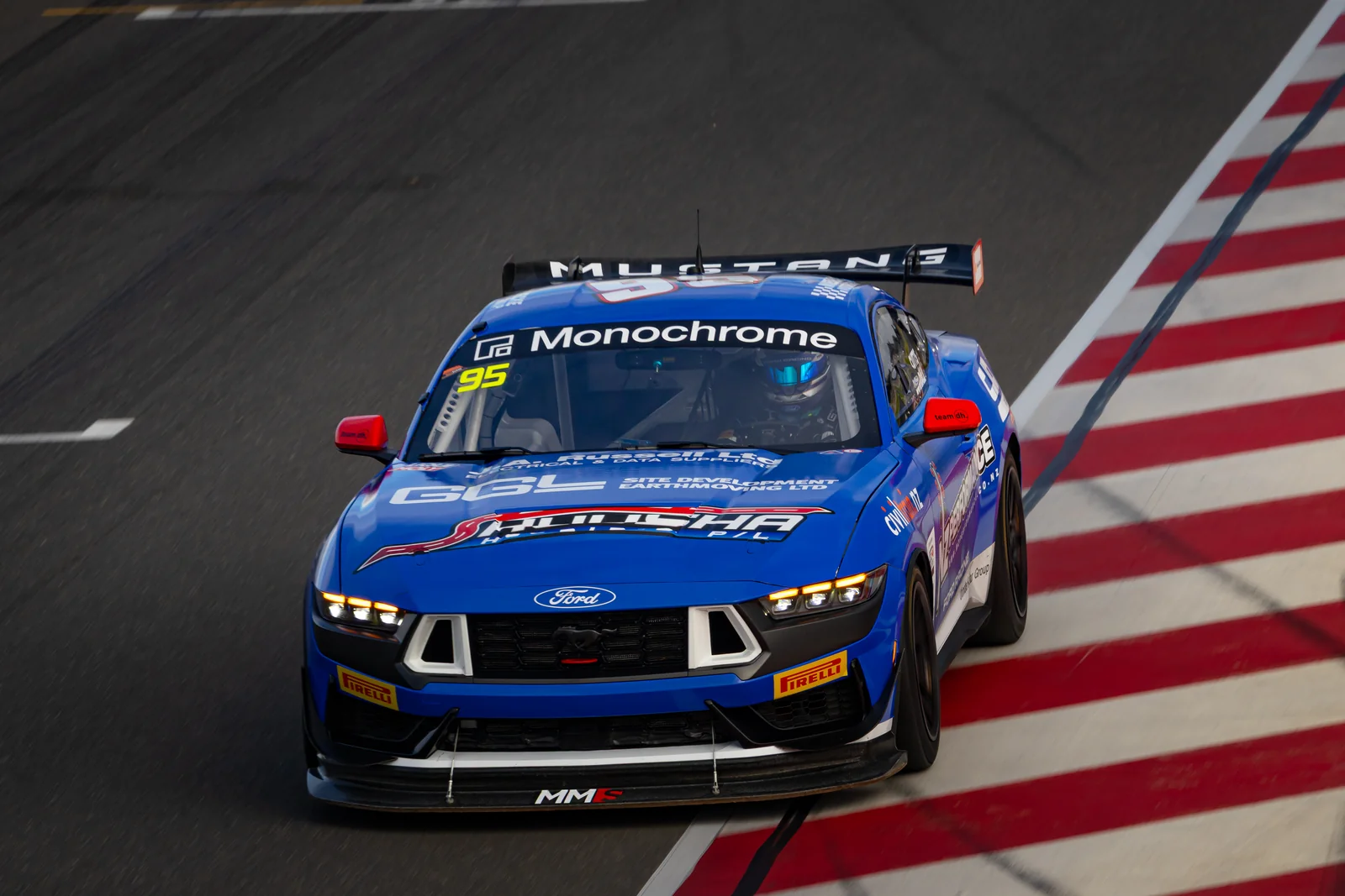 The Monochrome-liveried Ford Mustang GT4 head-on at The Bend