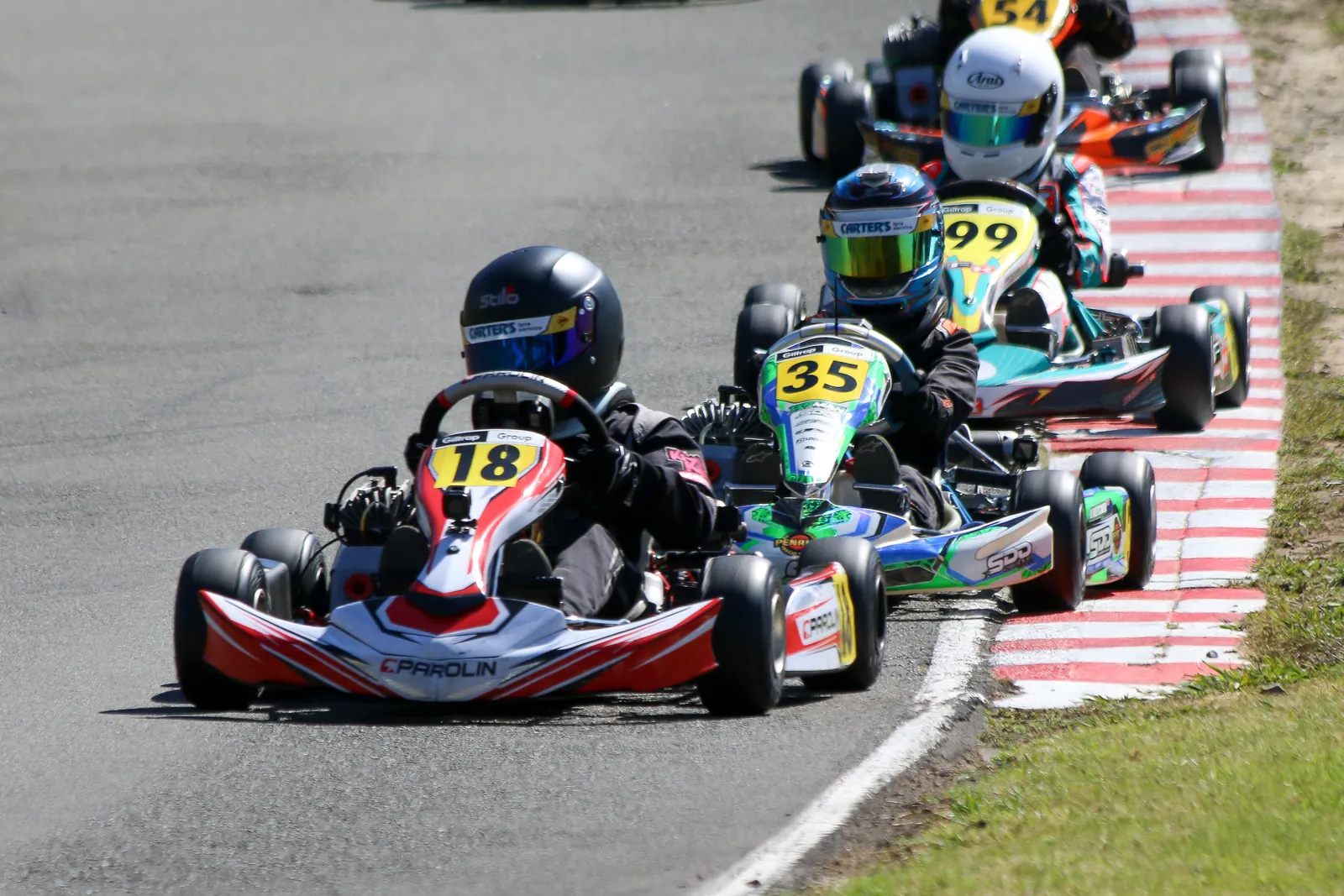 Blake Dowdall battling in the Mini ROK kart field