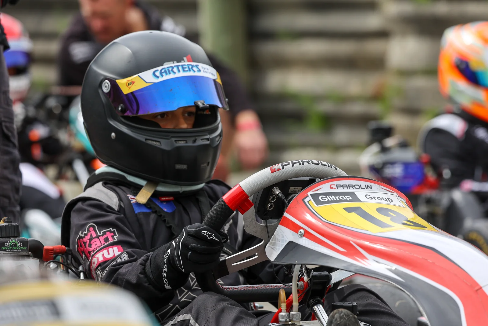 A young Blake Dowdall helmeted and ready for a Rotax kart race